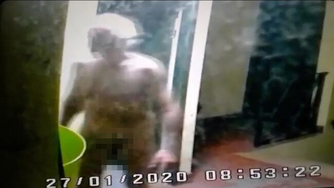 Screenshot of convicted wife killer Thomas Keir walking naked around the housing complex where he lived after getting out of jail.