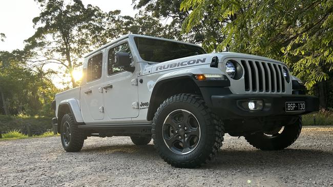 Big knobby tyres and a tough stance make the Jeep Gladiator Rubicon a standout on the road.