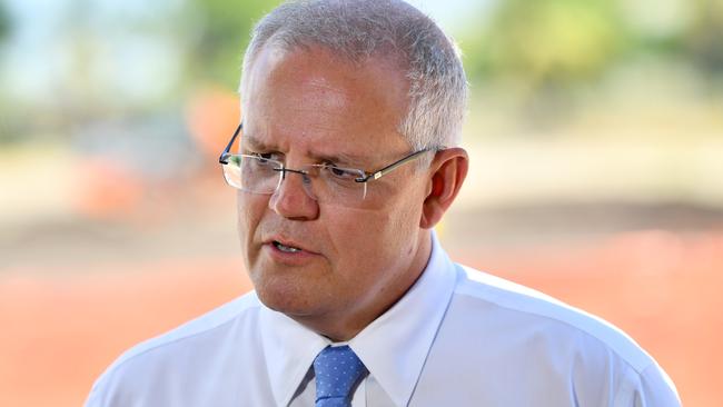 Prime Minister Scott Morrison, pictured at the Blackrock Camp in Nadi, Fiji on Saturday, is resisting Labor calls to expand his proposed ‘big stick’ energy powers.