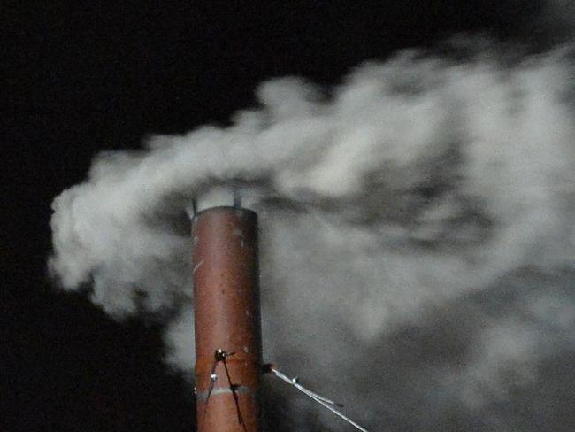 White smoke rising from the Sistine Chapel chimney signals the election of a new pope. Picture: AFP