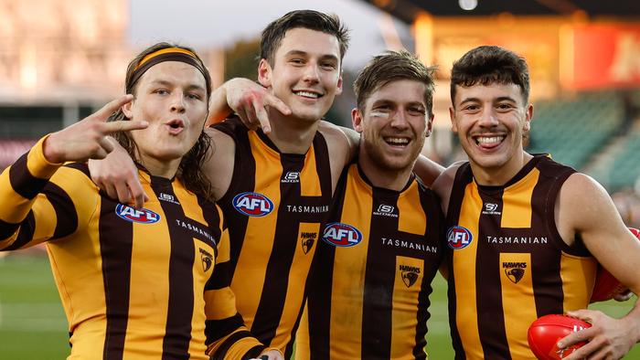 MELBOURNE, AUSTRALIA - JUNE 08: Jack Ginnivan, Connor Macdonald, Dylan Moore and Massimo D'Ambrosio of the Hawks pose for a photo during the 2024 AFL Round 13 match between the Hawthorn Hawks and the GWS GIANTS at UTAS Stadium on June 08, 2024 in Launceston, Australia. (Photo by Dylan Burns/AFL Photos)