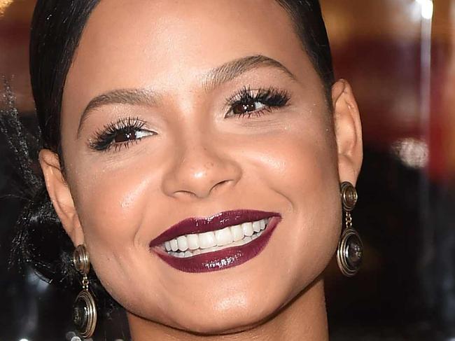 Actress Christina Milian arrives for the world premiere of Warner Bros. "Live By Night," January 9, 2017 at the TCL Chinese Theater in Hollywood, California. / AFP PHOTO / Robyn Beck