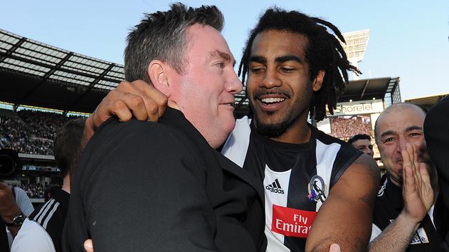 Heritier Lumumba and Eddie McGuire after Collingwood’s 2010 premiership win.