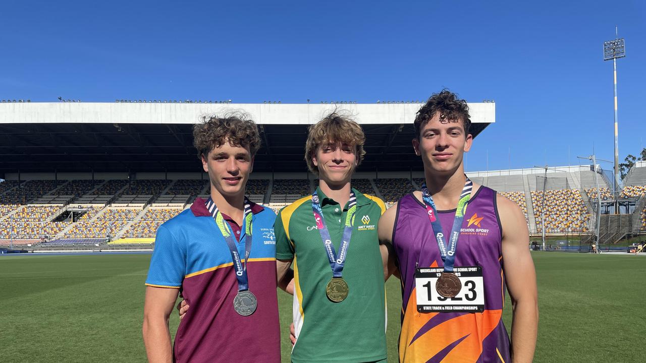 Dylan Gardner, St Peters Theo Harvey and Rocco Paludetto after the 16 years long jump.