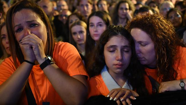 People in tel Aviv on Saturday night wear orange T-shirts representing the Bibas family during a rally calling for the remaining hostages to be released. Picture: Getty Images