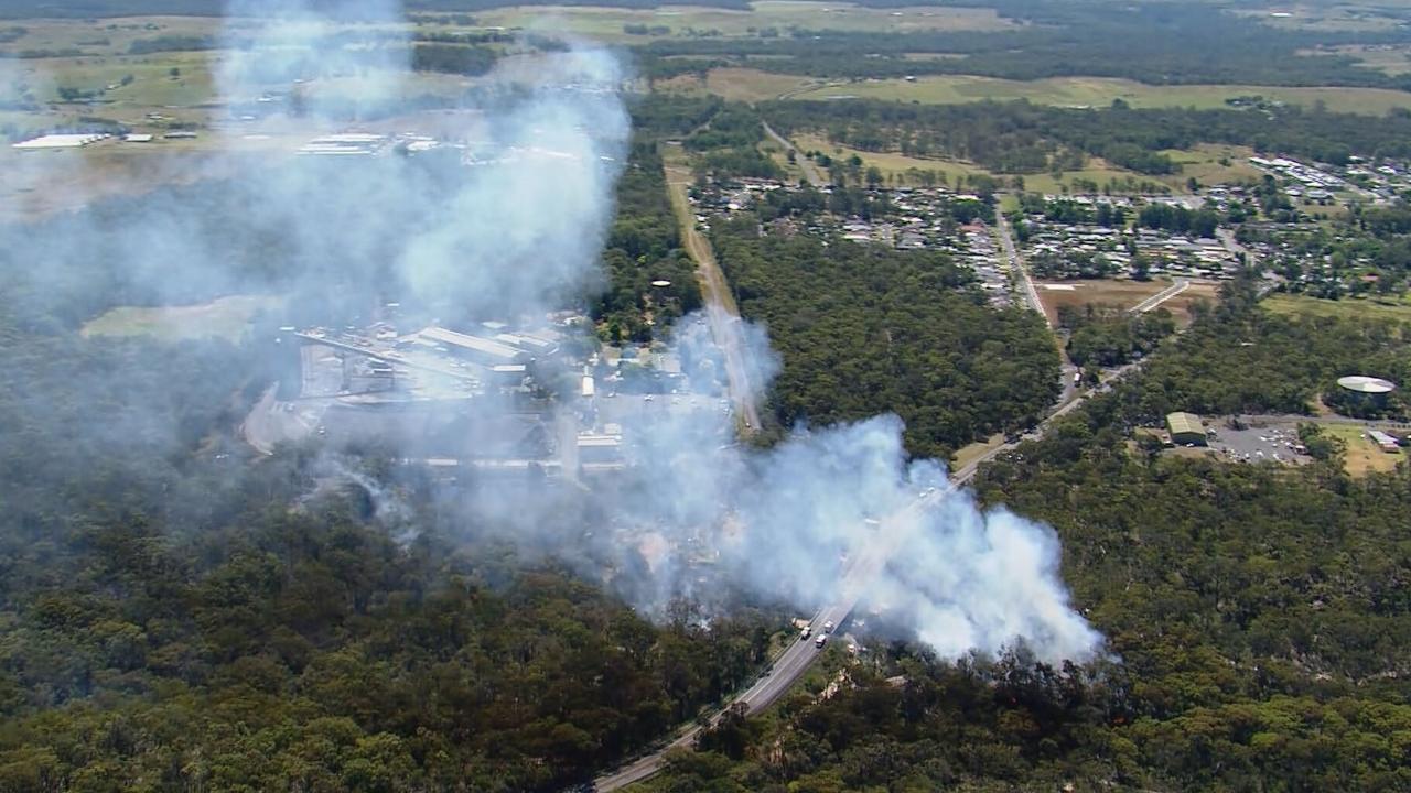 The scrub fire sparked an emergency services response before the wrecked plane was discovered, investigators said. Picture: 9News