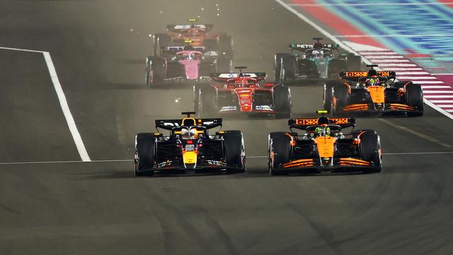 Verstappen (front left) and Norris (front right) are predicted to battle it out for the F1 title. (Photo by Joe Portlock/Getty Images)