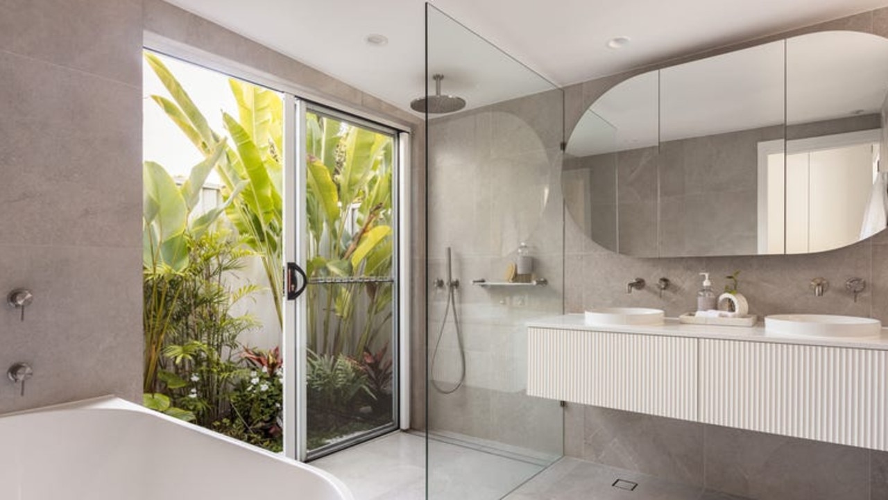 AFTER: One of the modern bathrooms with access to a private courtyard