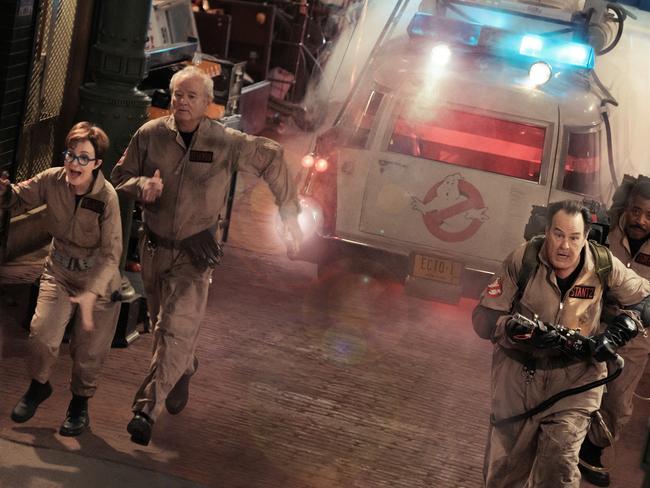 Pioneering Ghostbusters Janine (Annie Potts), Peter (Bill Murray), Ray (Dan Aykroyd) and Winston (Ernie Hudson).