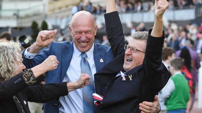 Rod West (right) celebrates with connections of Pinstriped after his upset win in the Memsie Stakes at Caulfield on Saturday. Pictures: Pat Scala/Racing Photos via Getty Images