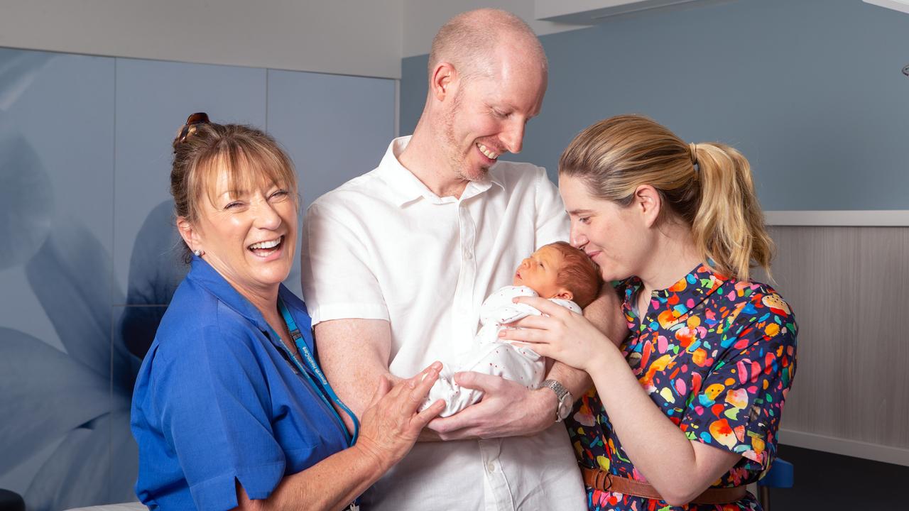 Midwife Joey O’Reilly with Ben, Laura and baby Oliver. Picture: Sarah Matray