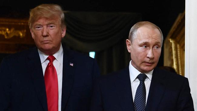 US President Donald Trump and Russian President Vladimir Putin arrive for a meeting in Helsinki, July 2018. Picture: Brendan Smialowski / AFP