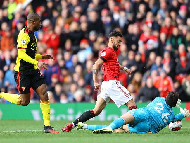 MANCHESTER, ENGLAND - FEBRUARY 23: Bruno Fernandes of Manchester United is fouled by Ben Foster of Watford resulting in a penalty during the Premier League match between Manchester United and Watford FC at Old Trafford on February 23, 2020 in Manchester, United Kingdom. (Photo by Richard Heathcote/Getty Images)