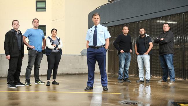 Assistant Commissioner Mark Jones with members of the Domestic Violence High Risk Offenders Team. Picture: Richard Dobson