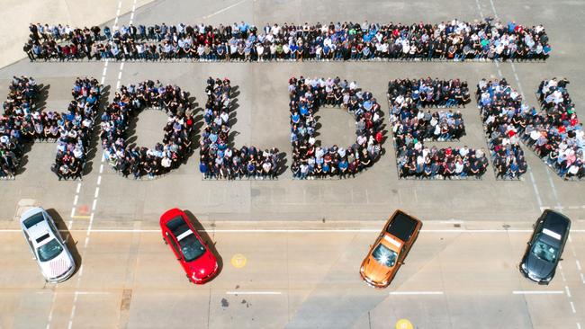 October 20, 2017, workers with the last cars to roll off their production line at Elizabeth in Adelaide.