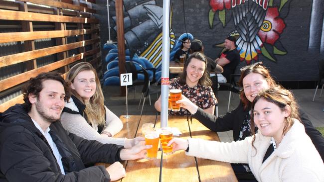 Sam Turner, Laura Blackmore, Jessica McGrath, Kate McCormack and Maddison Kate happy to be back at the pub.