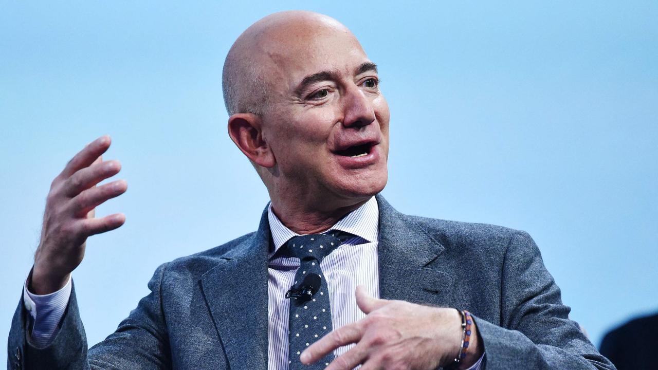 Amazon founder Jeff Bezos said he plans to give away most of his $124 billion fortune – but just hours later news of the job cuts leaked. Picture: Mandel Ngan/AFP