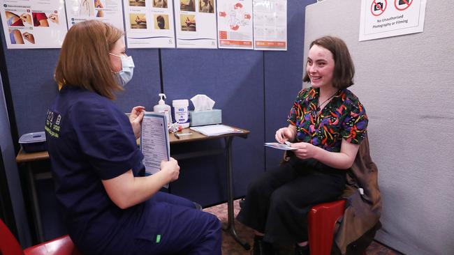 Student Holly Horne 16 in year 11 at Elizabeth College is given her first Pfizer vaccination by Anne-Maree Kroon authorised nurse immuniser. COVID vaccinations for students at Elizabeth College in Hobart. Picture: Nikki Davis-Jones