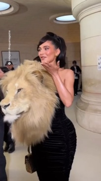 Kylie Jenner Accessorizes With a Giant Faux Lion Head for Paris