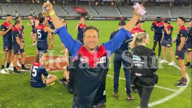 Melbourne cocktail bar owner Hayden Burbank on Optus Oval after the grand final.