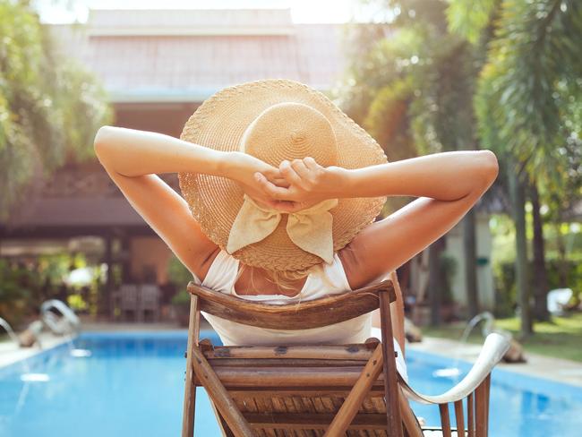 woman relaxing in luxury hotel, summer holidays Retirement Vacation Concept, no kids Photo: IStock