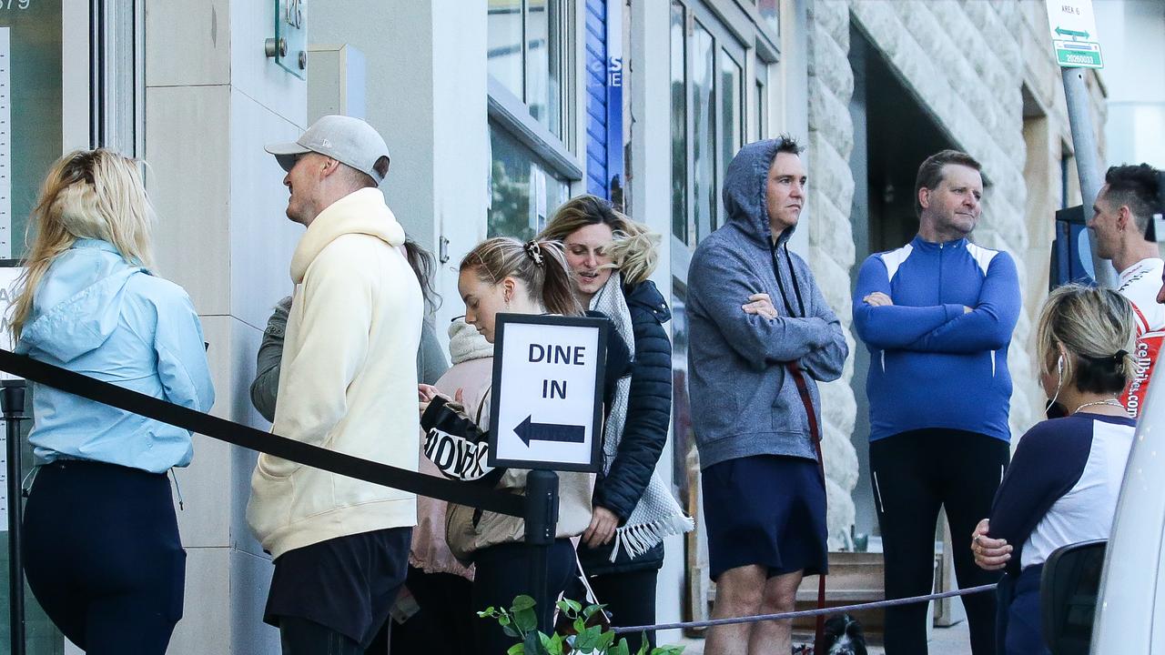 People line up to dine-in cafes in Bondi.