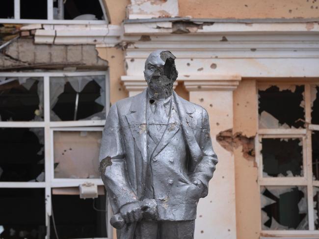 A damaged monument to Vladimir Lenin stands in a central square in Sudzha. The town, recently claimed by Russian forces, was the largest Ukrainian-held settlement in Kursk before the retreat. Picture: AP