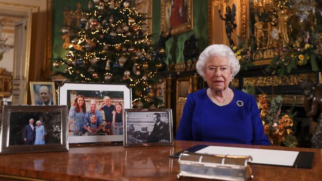 Queen Elizabeth recorded her Christmas broadcast in 2021 without a photo of Prince Harry and his family on her table. Picture: Steve Parsons/WPA Pool/Getty Images