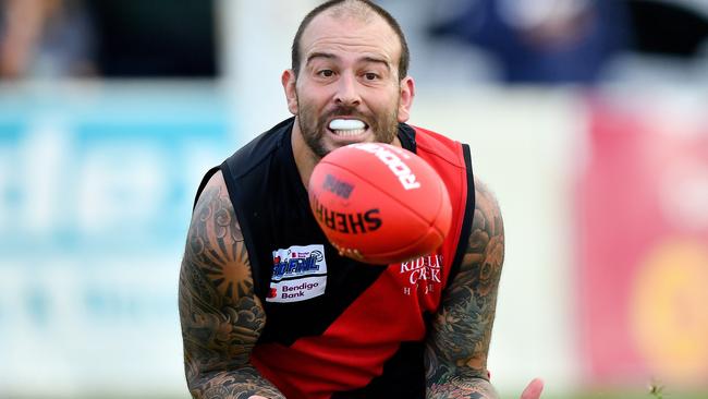 Dean Galea of Riddell marks during the round two RDFNL Bendigo Bank Seniors match between Riddell and Kyneton at Riddells Creek Recreation Reserve, on April 13, 2024, in Diggers Rest, Australia. (Photo by Josh Chadwick)