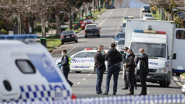 Police comb the area for clues and want drivers to check their dashcams. Picture: Jason Edwards