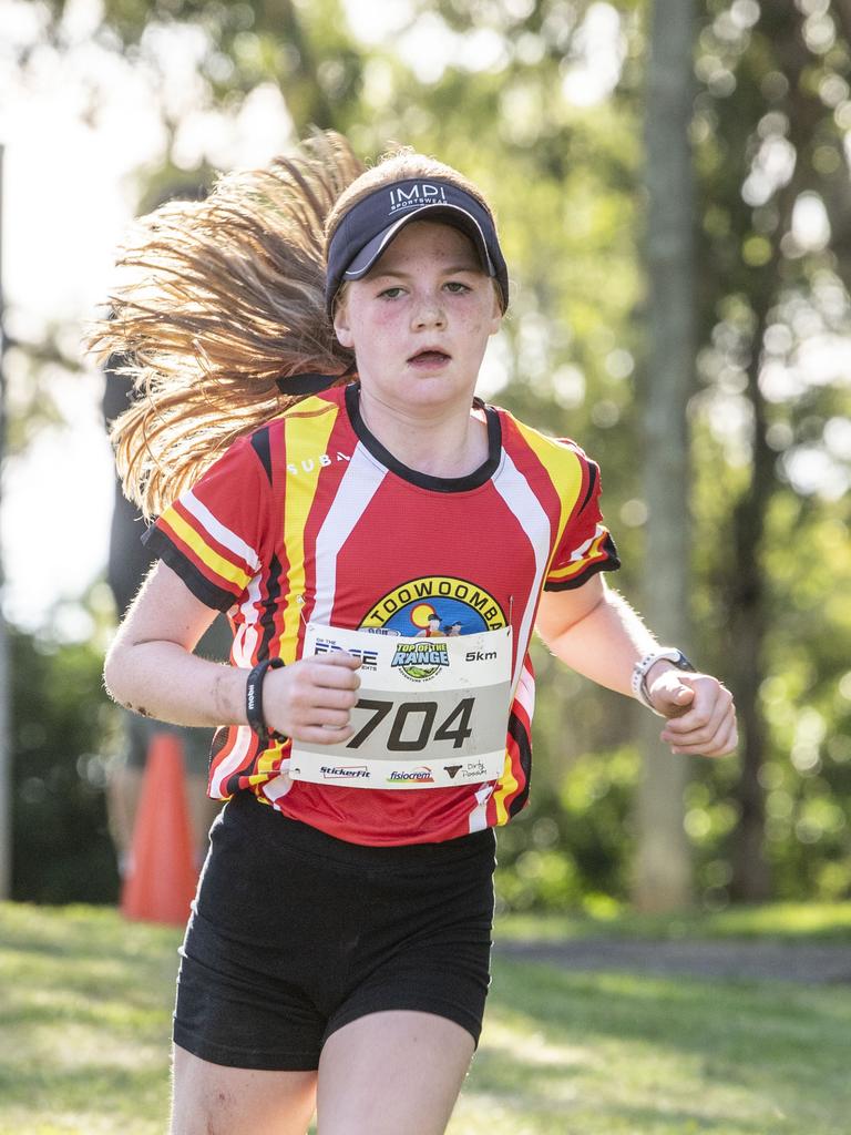 Eden Broksch is the second finisher in the 5km event. Top of the Range adventure trail run at Picnic Point. Sunday, April 2, 2023. Picture: Nev Madsen.