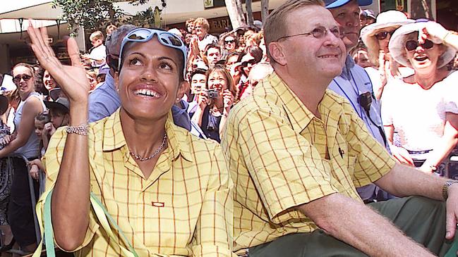 Cathy Freeman, left, and Coates during the ticker tape parade in Sydney, after the 2000 Olympic Games. Picture: Adam Ward