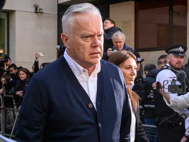 LONDON, ENGLAND - SEPTEMBER 16: Former BBC broadcaster Huw Edwards leaves court after receiving a six-month jail sentence suspended for two years for accessing indecent images of children at Westminster Magistrates' Court on September 16, 2024 in London, England. On July 31, 2024, Veteran News Reader Huw Edwards pleaded guilty to three counts of making indecent pictures of children between 2020 and 2022, 37 images were shared on WhatsApp. He was arrested in November 2023. Edwards was the BBC's Ten O'clock News anchor and was chosen to announce the death of HM Queen Elizabeth II to the nation. (Photo by Leon Neal/Getty Images)