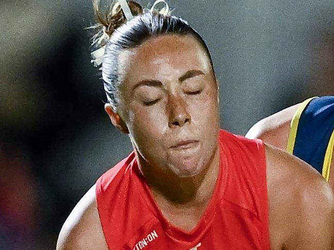 ADELAIDE, AUSTRALIA - NOVEMBER 18:  Paige Sheppard of the Swans tackled by  Anne Hatchard of the Crows during the AFLW First Semi Final match between Adelaide Crows and Sydney Swans at Norwood Oval, on November 18, 2023, in Adelaide, Australia. (Photo by Mark Brake/Getty Images)