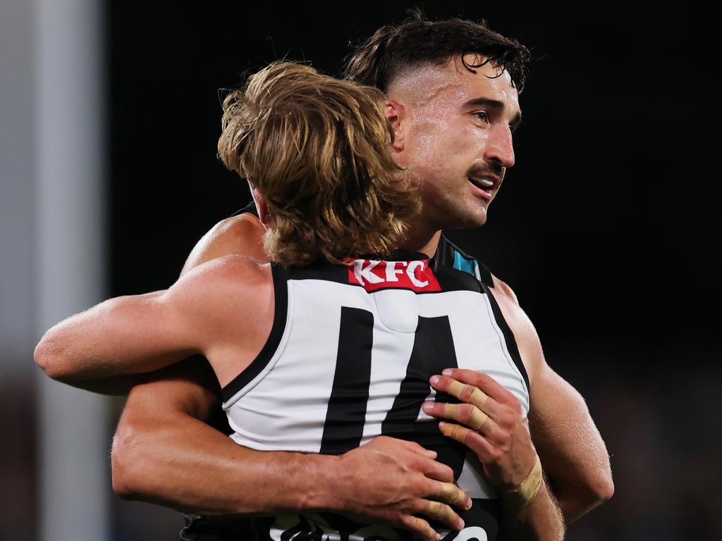 ADELAIDE, AUSTRALIA - APRIL 13: Miles Bergman and Ivan Soldo of the Power celebrate a goal during the 2024 AFL Round 05 match between the Port Adelaide Power and the Fremantle Dockers at Adelaide Oval on April 13, 2024 in Adelaide, Australia. (Photo by James Elsby/AFL Photos via Getty Images)