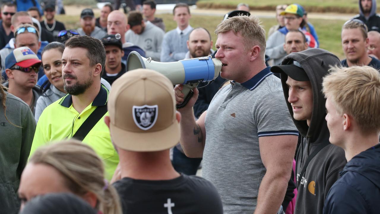 Convicted criminals Neil Erikson and Blair Cottrell address attendees of their ‘patriots’ rally in Melbourne. Picture: AAP