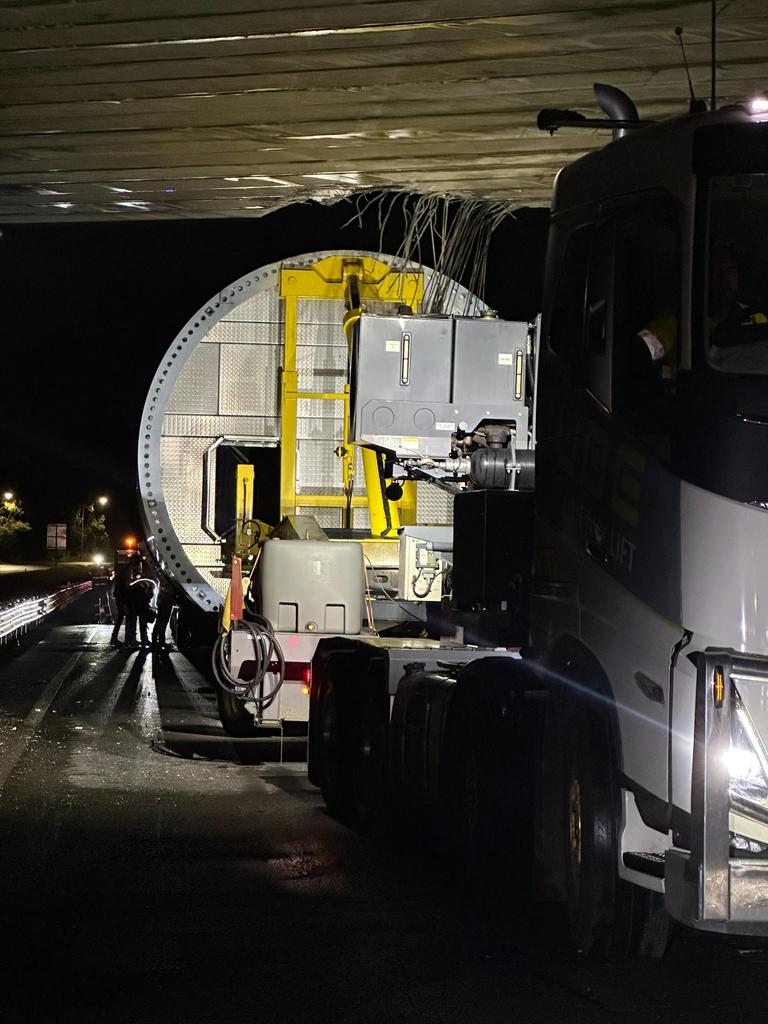 The wind turbine being removed from the bridge. Picture: TMR