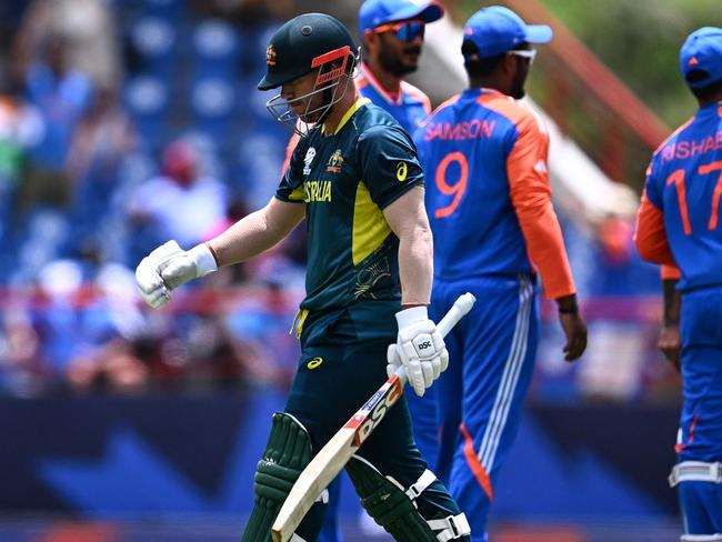 Australia's David Warner walks out after being dismissed during the ICC men's Twenty20 World Cup 2024 Super Eight cricket match between Australia and India at Daren Sammy National Cricket Stadium in Gros Islet, Saint Lucia on June 24, 2024. (Photo by Chandan Khanna / AFP)