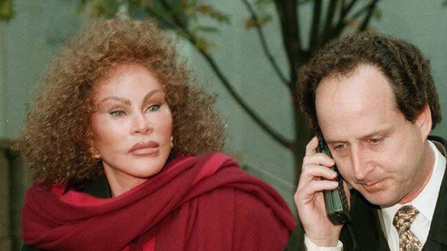 Jocelyn Wildenstein, wife of art dealer Alec Wildenstein, outside court with her lawyer Bernard Clair in March 1998. Picture: Supplied