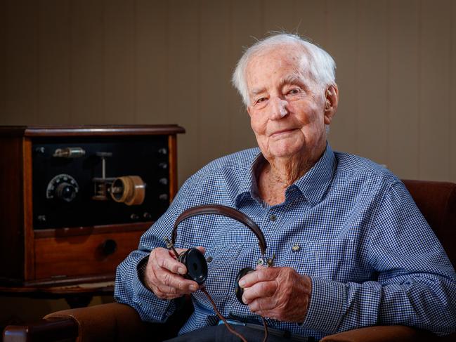 Colin Wagener Aged 105 with a radio set he used in World War II at his property in the Adelaide Hills. Picture: Matt Turner.