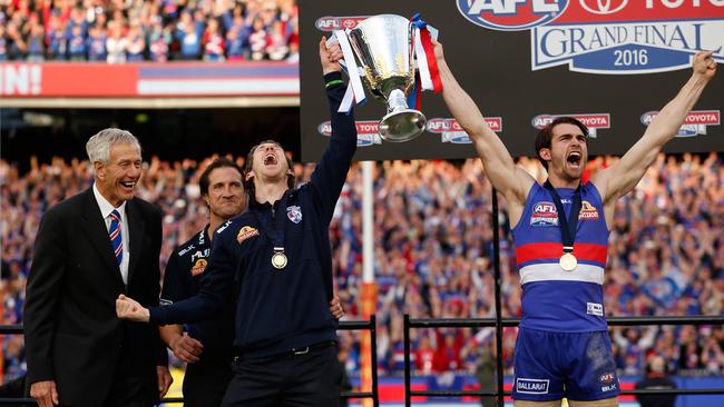 John Schultz, Luke Beveridge, Senior Coach of the Bulldogs, Robert Murphy of the Bulldogs and Easton Wood of the Bulldogs celebrate during the 2016 Toyota AFL Grand Final. (Photo by Michael Willson/AFL Media/Getty Images)