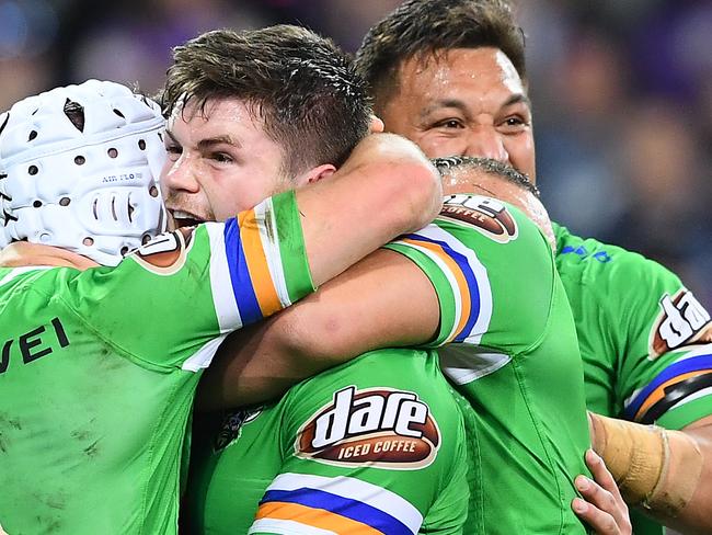 MELBOURNE, AUSTRALIA - SEPTEMBER 14: John Bateman of the Raiders is congratulated by team mates after scoring a try during the NRL Qualifying Final match between the Melbourne Storm and the Canberra Raiders at AAMI Park on September 14, 2019 in Melbourne, Australia. (Photo by Quinn Rooney/Getty Images)