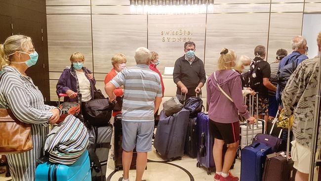 Norwegian Jewel passengers arrive at Swissotel in Sydney’s CBD for 14 days self isolation. Picture: Tom Huntley