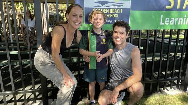 Tahmeeka, Tyrone, and Dylan on Tyrone's first day of school at Golden Beach State School. Picture: Iwan Jones