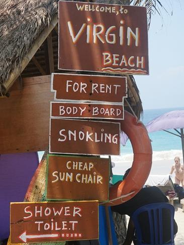 A charming makeshift sign details the many delights of Virgin Beach.