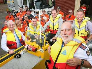 Ipswich SES local controller Arie van den Ende (front) tests out the new boat with Ipswich Mayor Paul Pisasale and Member for Ipswich West Wayne Wendt, while Queenslanders Credit Union and Professional Credit Union CEOs John Weier and Paul McGrath look on (left). Picture: Rob Williams