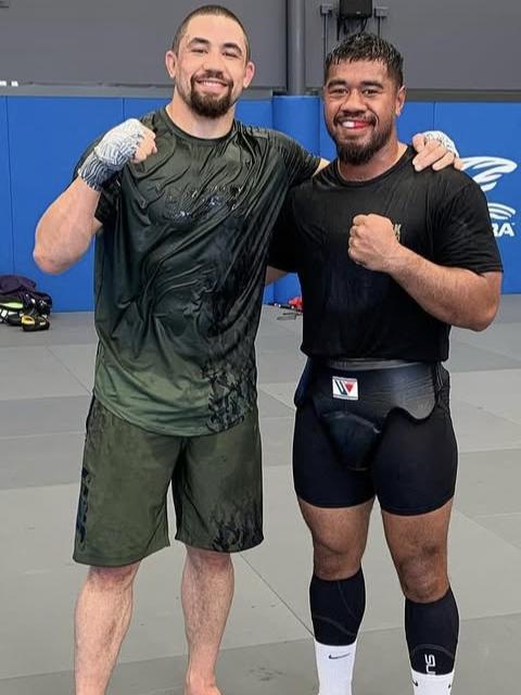 Tongotongo with UFC supestar Robert Whittaker. Picture: Supplied