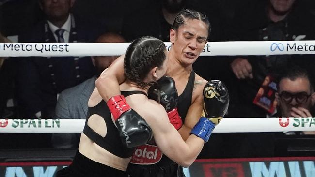 Irish boxer Katie Taylor (left) was accused of headbutts against Amanda Serrano. (Photo by TIMOTHY A. CLARY/AFP)