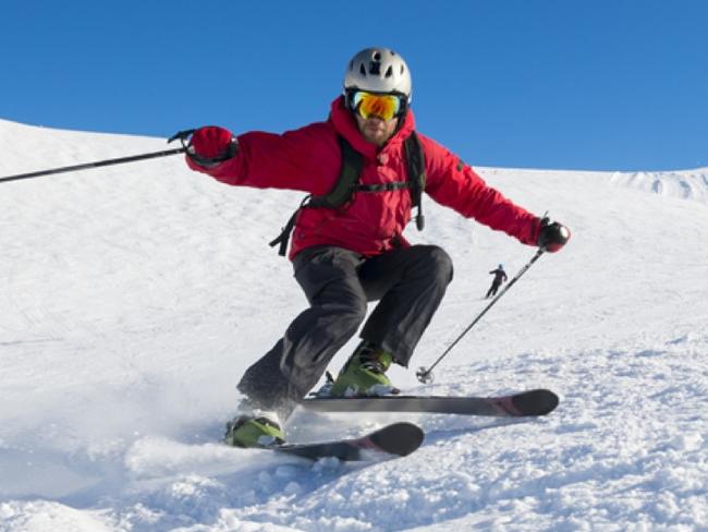 ESCAPE DEALS 9 MAY - QUEENSTOWN Skier turning on a blue sky day. Part of a series.image suppliedescapeDEALS9 may 2021