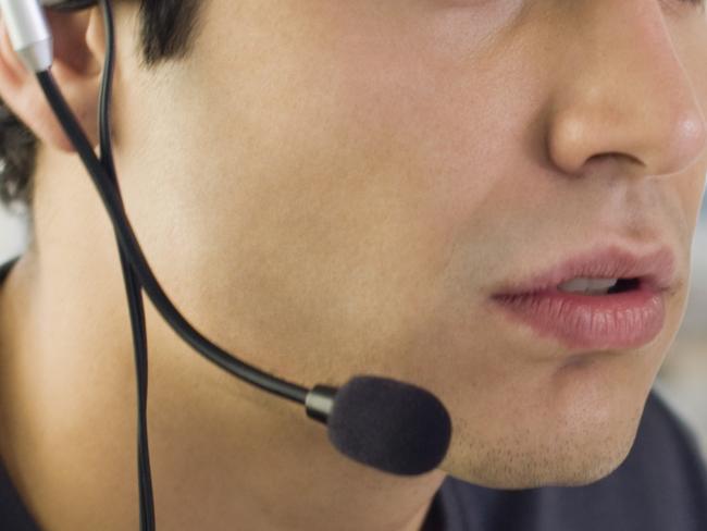 TELEMARKETER .. Businessman wearing headset